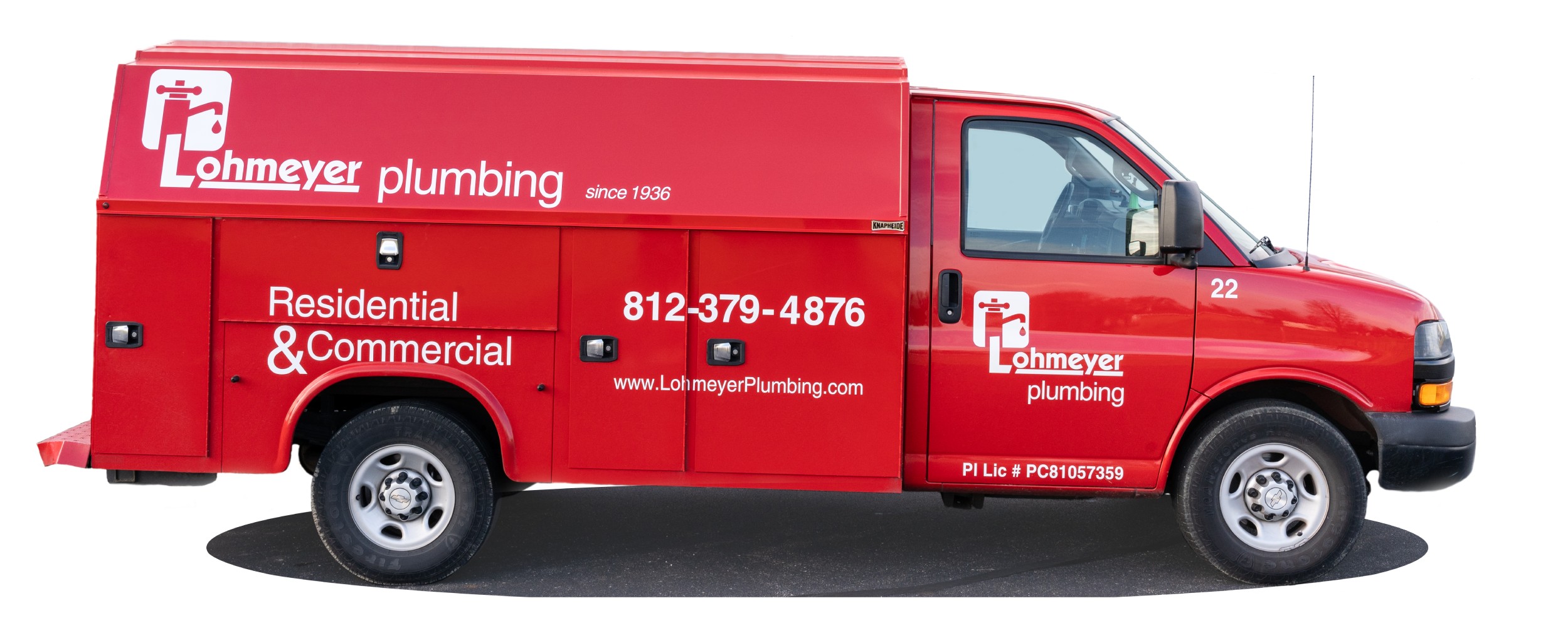 Red Lohmeyer Plumbing truck, viewed from the side