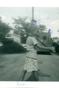 Young "Joey" guarding a Lohmeyer Plumbing truck.