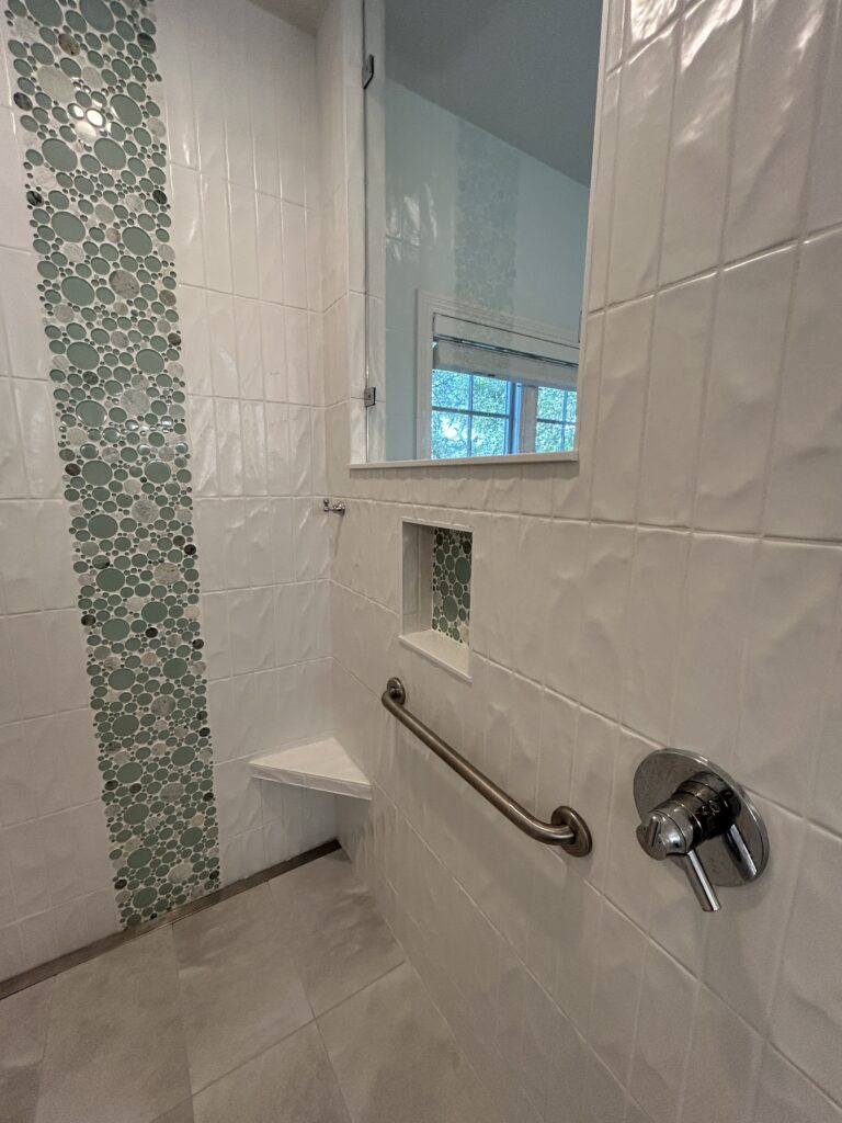 Bathroom remodel in Columbus, Indiana featuring a new walk-in shower and updated finishes.